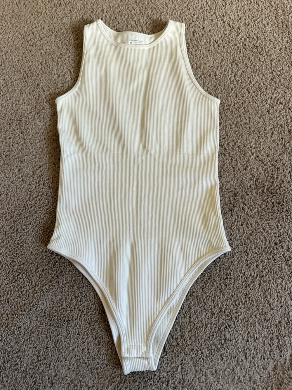 OQQ Ribbed Cream Bodysuit.